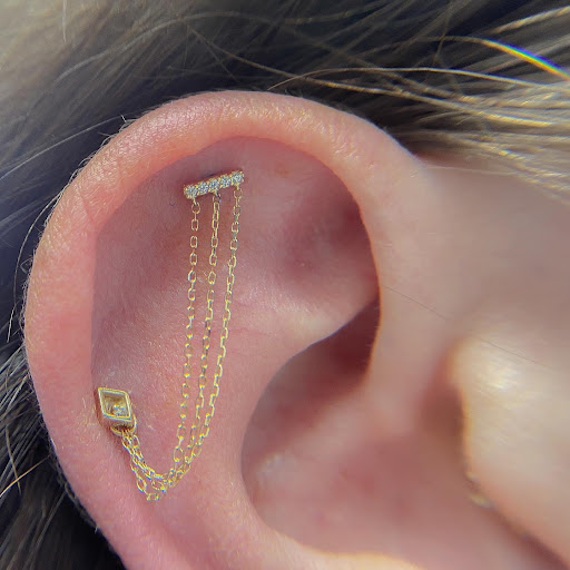 Explore bodybuilding tattoo ideas, creative tattoo ideas in Worcester, available at Elegance Piercing & Tattoo Inc.