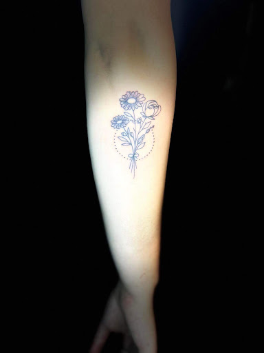 Explore lower back tattoo ideas for females, creative tattoo ideas in New Hampton, available at Crescent Moon Tattoo