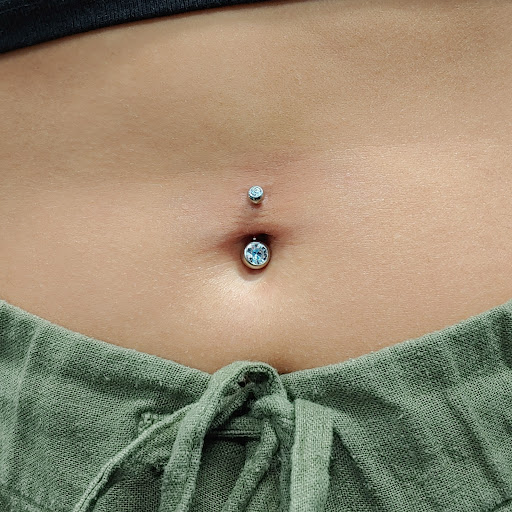 Explore roman numerals tattoo ideas, creative tattoo ideas in San Marcos, available at Ollie the Impaler Body Piercing