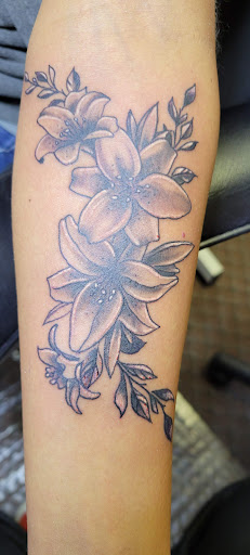 Explore twilight tattoo ideas, creative tattoo ideas in Angola, available at Hoodlum Ink