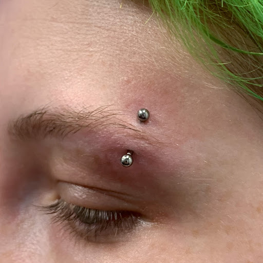 Explore packer tattoo ideas, creative tattoo ideas in Sarasota, available at Z-Edge Tattoo and Body Piercing North Shop