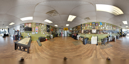 Tattoo Shop «Tattoo Machine Gun- Clark», reviews and photos, 1705 Charlestown New Albany Rd a, Jeffersonville, IN 47130, USA