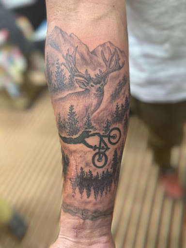 Explore bass clef tattoo ideas, creative tattoo ideas in Louisville, available at Inksmith Tattoo and Piercing