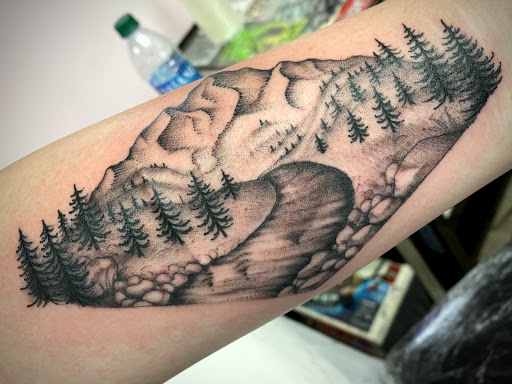 Explore broken chain tattoo ideas, creative tattoo ideas in New Orleans, available at TOUGH LOVE TATTOOS