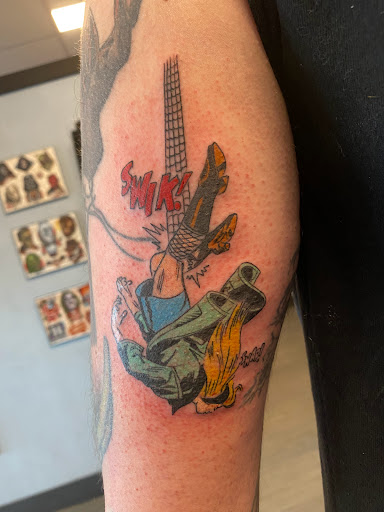 Explore flower tattoo ideas for guys, creative tattoo ideas in Palm Harbor, available at Angry Owl Tattoo and Piercing