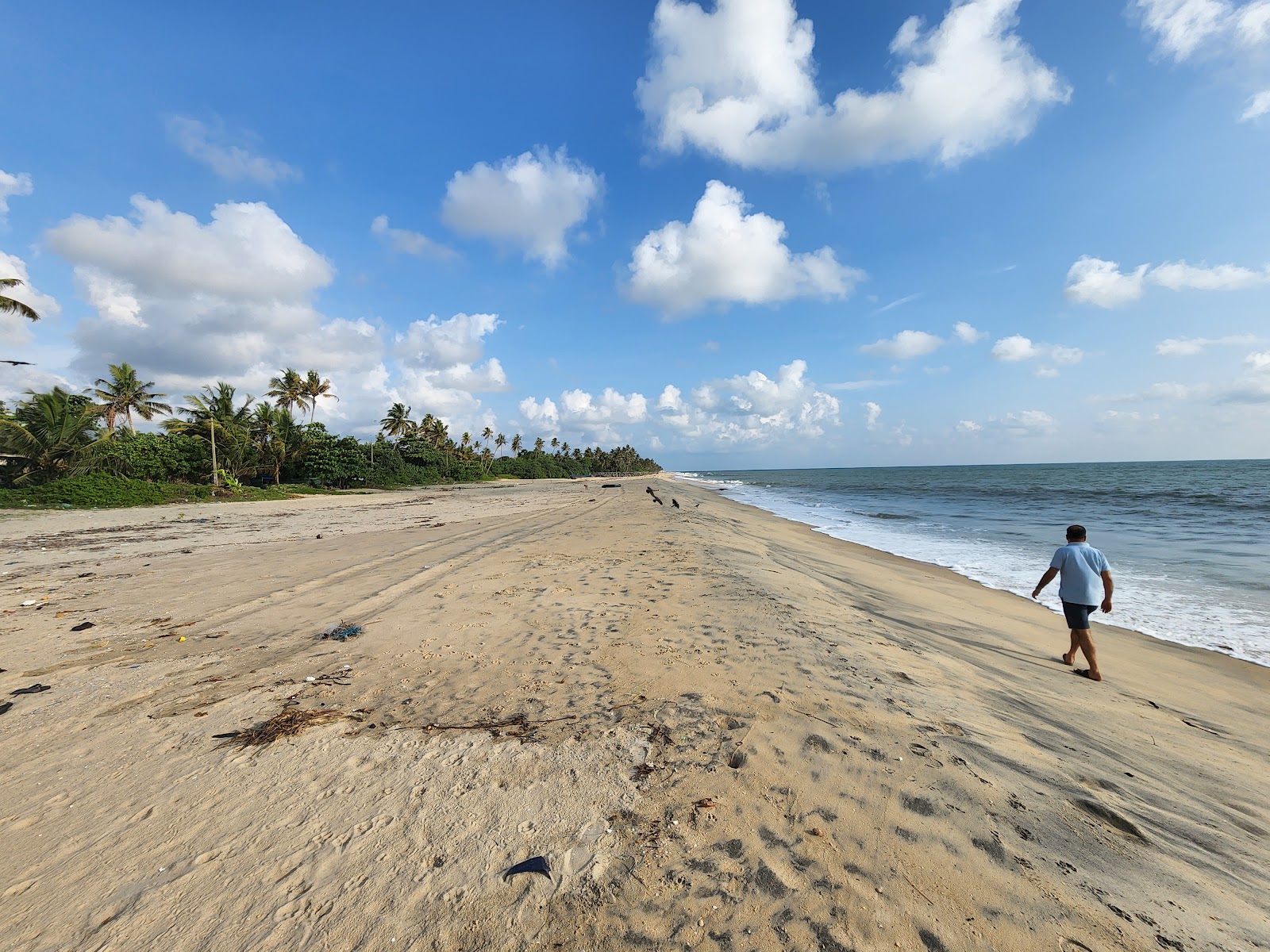 Foto van Thumpoly Beach met beige zand oppervlakte