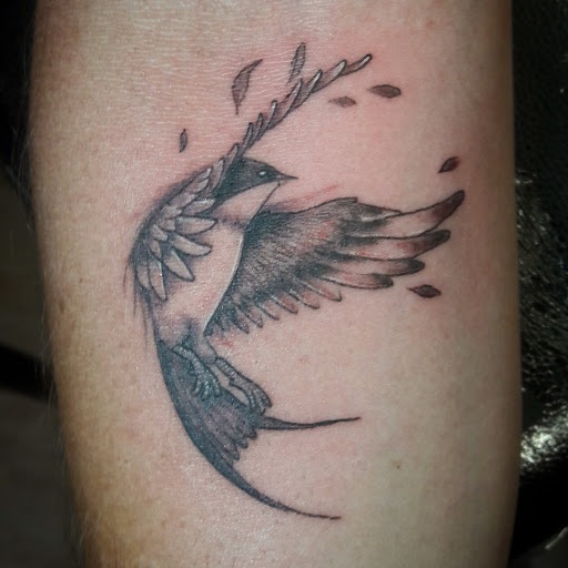 Explore neck tattoo ideas for men, creative tattoo ideas in Kenosha, available at Kenosha Tattoo Company