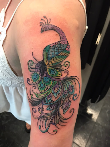 Explore tattoo cake ideas, creative tattoo ideas in Rogers, available at Jimmy Romance Tattoo & Body Piercing