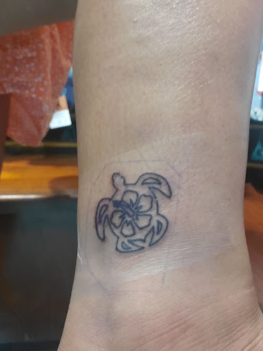 Explore women's bum tattoo ideas, creative tattoo ideas in Honolulu, available at Aloha Tattoo Waikiki Hilton Hawaiian Village Rainbow Bazaar