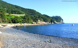 Foto von Deokdong Beach mit geräumige bucht