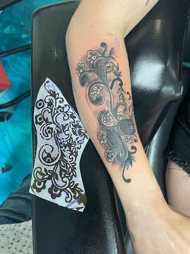 Explore mother son tattoo ideas, creative tattoo ideas in Traverse City, available at Pinups & Needles