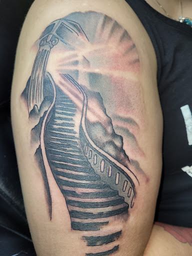 Explore matching tattoo ideas for siblings, creative tattoo ideas in Angola, available at Hoodlum Ink