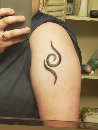 Explore dog paw print tattoo ideas, creative tattoo ideas in Whitesboro, available at Nevermore Tattoo
