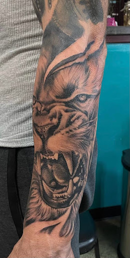 Explore wolf tattoo ideas for guys, creative tattoo ideas in Spring, available at Skin Stories Tat2