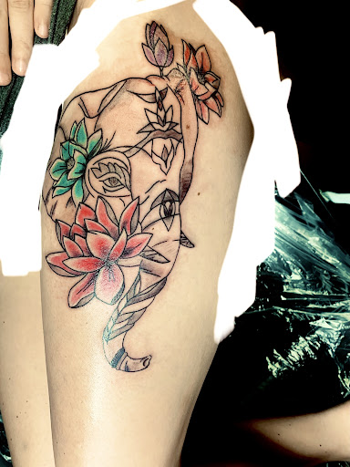 Explore catfish tattoo ideas, creative tattoo ideas in Lake City, available at Crooked Spines Tattoo Studio