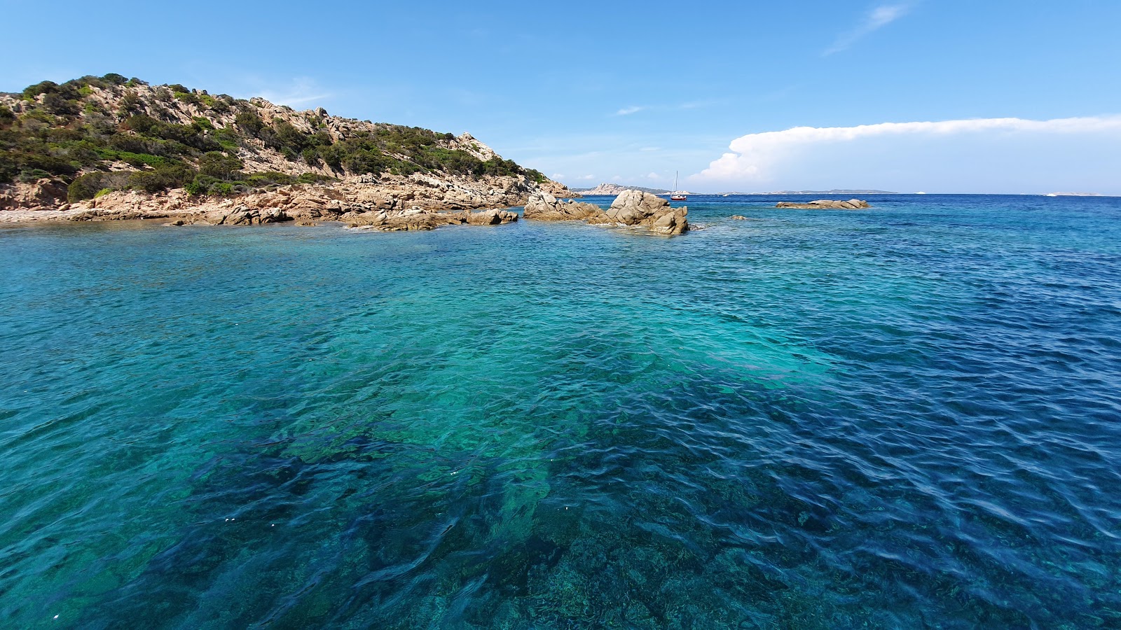 Photo of Cala Bonifazzinca with turquoise pure water surface