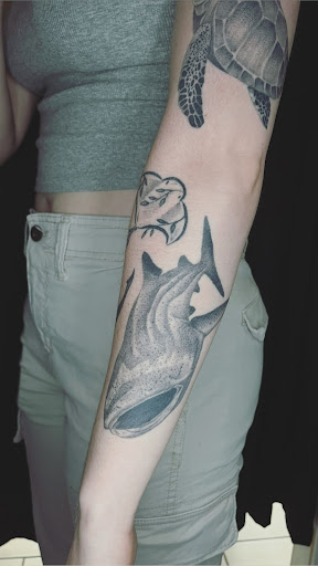 Explore bald head tattoo ideas, creative tattoo ideas in Cadillac, available at Limitless Ink Tattoo Studio