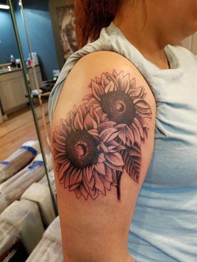 Explore yellowstone tattoo ideas, creative tattoo ideas in Crestview, available at Tommy Gunns Tattoo