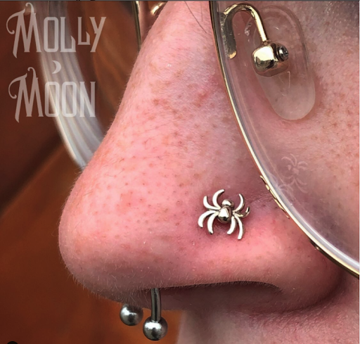 Explore holy tattoo ideas, creative tattoo ideas in Oshkosh, available at Piercings by Molly Moon at 920 Tattoo and Piercing