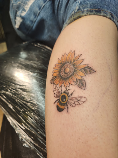 Explore ski mask tattoo ideas, creative tattoo ideas in Monterey, available at Gold Coast Tattoo and piercing