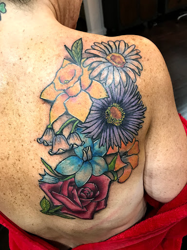 Find gay tattoo ideas for guys for your next unique tattoo in Kansas City at Golden Stag Tattoo and Gallery