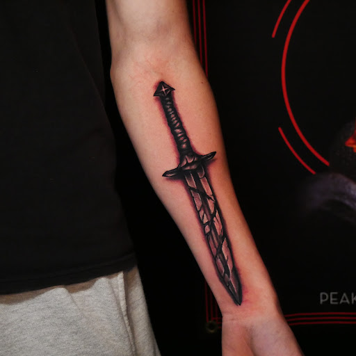 Explore elbow tattoo ideas female, creative tattoo ideas in Warren, available at Apothic Ink Tattoo Studio