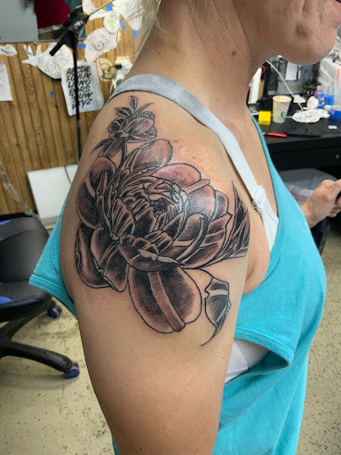 Find cloud tattoo ideas for your next unique tattoo in Hattiesburg at Sinful Aart Tattoo