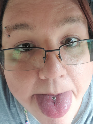 Explore blackout cover up tattoo ideas, creative tattoo ideas in Saint Paul, available at Electric Strawberry Piercing