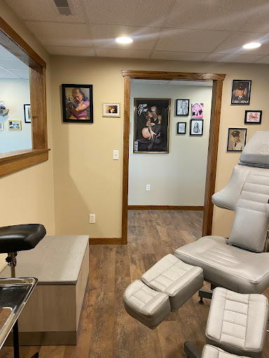 Find tattoo armband ideas for your next unique tattoo in Moundsville at Cherry Haze Tattoo