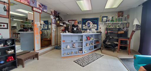 Explore fourth wing tattoo ideas, creative tattoo ideas in Boonville, available at UYS Under Your Skin Tattoos and Piercings