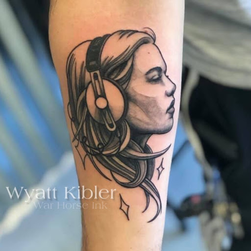 Find arm band tattoo ideas for your next unique tattoo in Kent at War Horse Ink