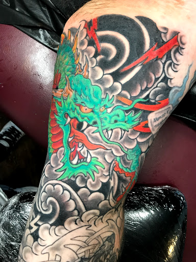Explore small dragon tattoo ideas, creative tattoo ideas in Sioux Falls, available at Heart Tattoo