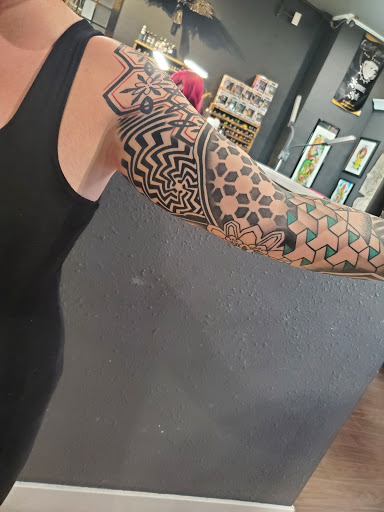 Explore side stomach tattoo ideas, creative tattoo ideas in Orem, available at Hearts and Hands Tattoo and Piercing