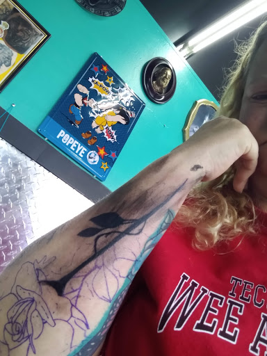 Explore badass female tattoo ideas, creative tattoo ideas in Dayton, available at Uppity Tattoos