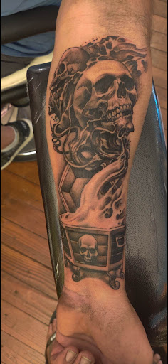 Explore tattoo ideas of strength, creative tattoo ideas in Pahoa, available at Electric Jungle Tattoo