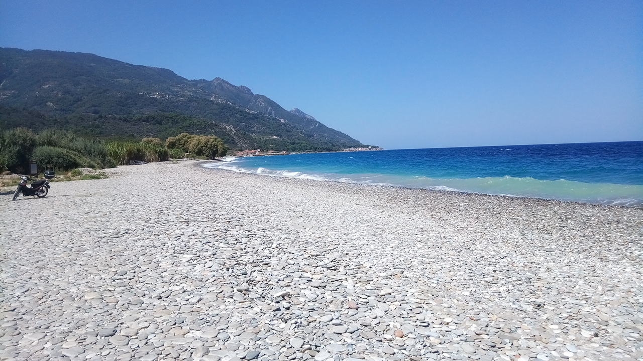Photo of Coast of Vourlioton with blue pure water surface