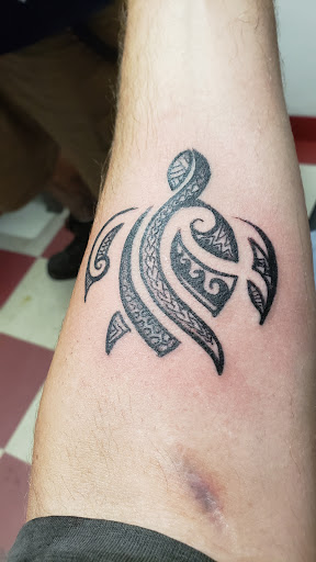 Explore blacklight tattoo ideas, creative tattoo ideas in Peoria, available at Mad Tattoo and Piercing