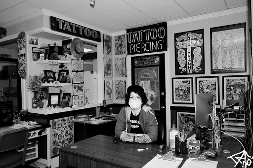 Explore smile tattoo ideas, creative tattoo ideas in Manchester, available at New Inkland Tattoo Co