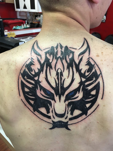 Explore mens sleeve tattoos ideas, creative tattoo ideas in Largo, available at Alchemy Tattoos and Body Piercings