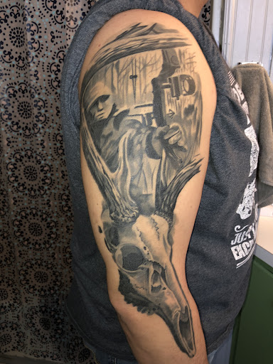 Explore men's shin tattoo ideas, creative tattoo ideas in Grand Haven, available at Ink Haven Tattoo Studio