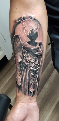 Explore tattoo ideas for son on mom, creative tattoo ideas in Charlotte, available at Black Cloud Tattoo & Piercing