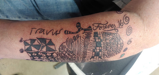 Explore rib tattoo ideas for men, creative tattoo ideas in Reno, available at My Religion Tattoo - No Piercing