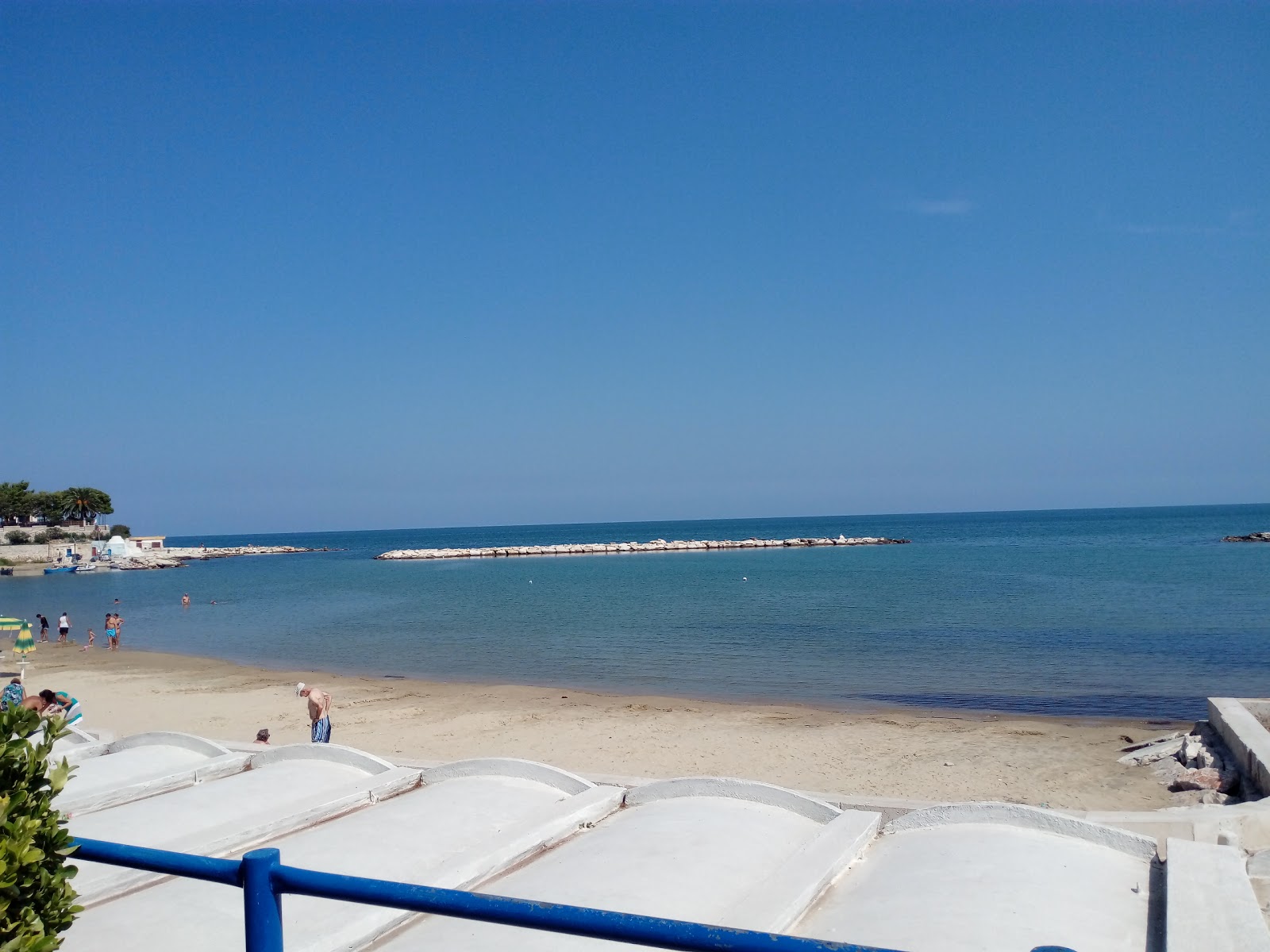 Photo of Lido Cala Colonna with blue pure water surface