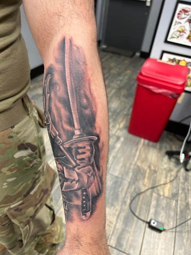 Explore cross wrist tattoo ideas, creative tattoo ideas in El Paso, available at American Tattoo Society of Ft Bliss