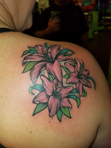 Explore snake tattoo ideas, creative tattoo ideas in Glendale, available at Double Down Tattoo and Body Piercing