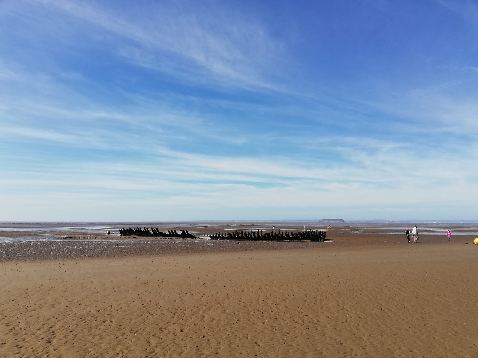 Foto di Spiaggia di Berrow con una superficie del acqua cristallina