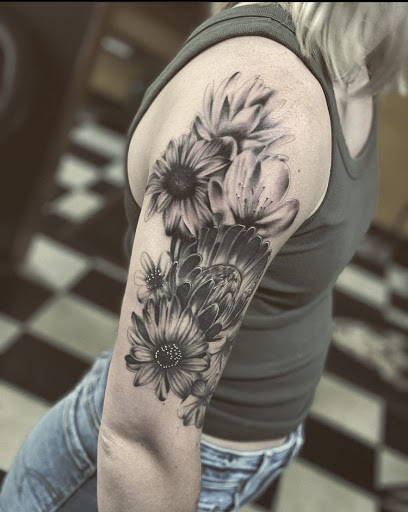 Explore chainsaw tattoo ideas, creative tattoo ideas in Stevens Point, available at Black Rabbit Tattooing