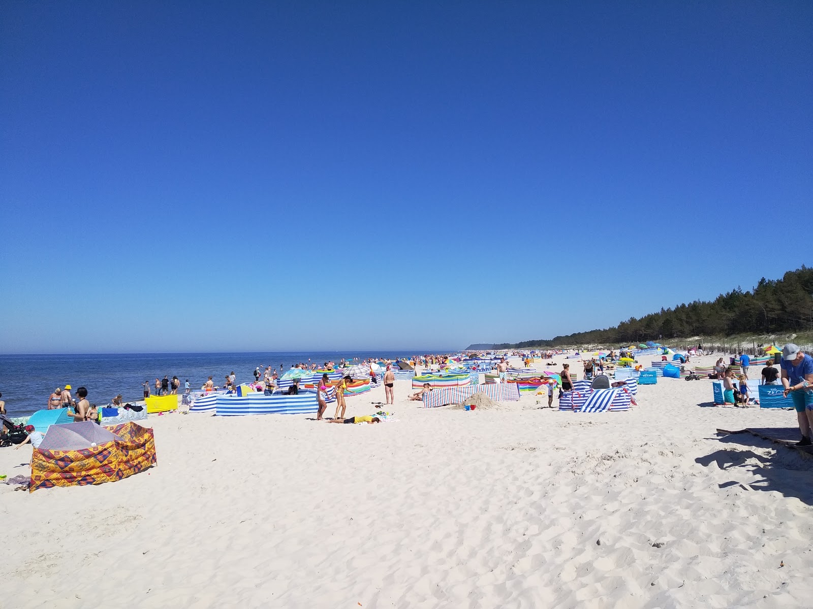 Foto de Plaża Karwia con arena beige superficie