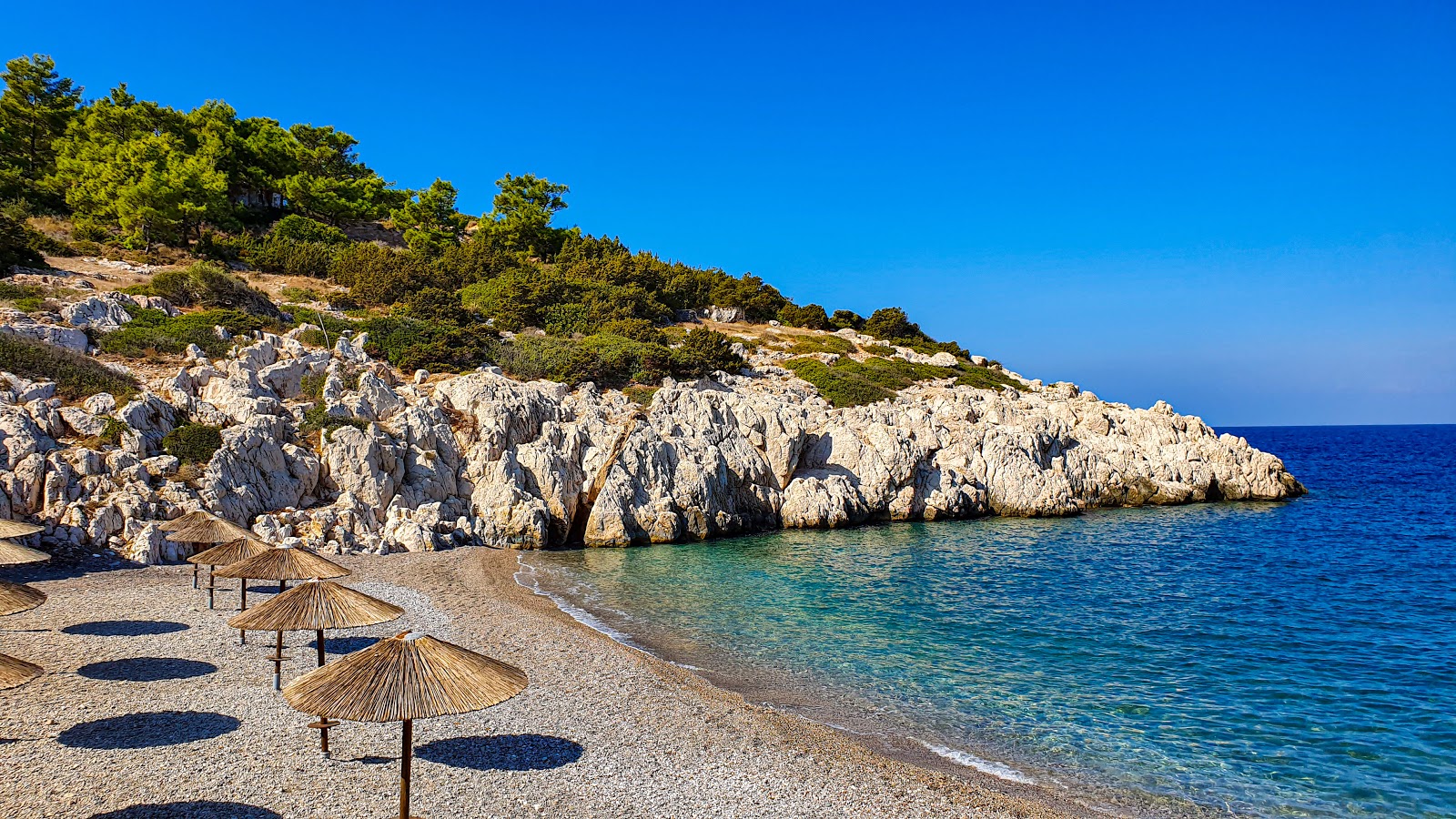 Photo of Κοpria Beach with turquoise pure water surface