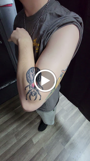 Explore arm tattoo ideas for females, creative tattoo ideas in Largo, available at Alchemy Tattoos and Body Piercings